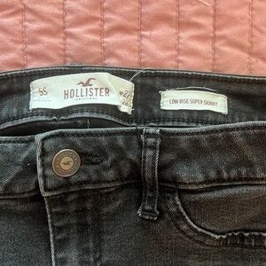 Black skinny low rise jeans